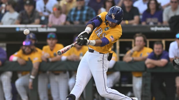 LSU Tigers right fielder Brayden Jobert (6) singles against the Florida Gators in the second inning at Charles Schwab Field Omaha.